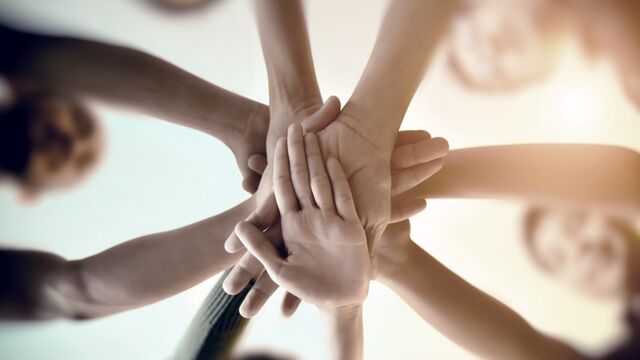 Nordea_xx_small-Team Teamwork Join Hands Partnership Concept